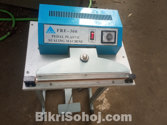 Packet sealing machine